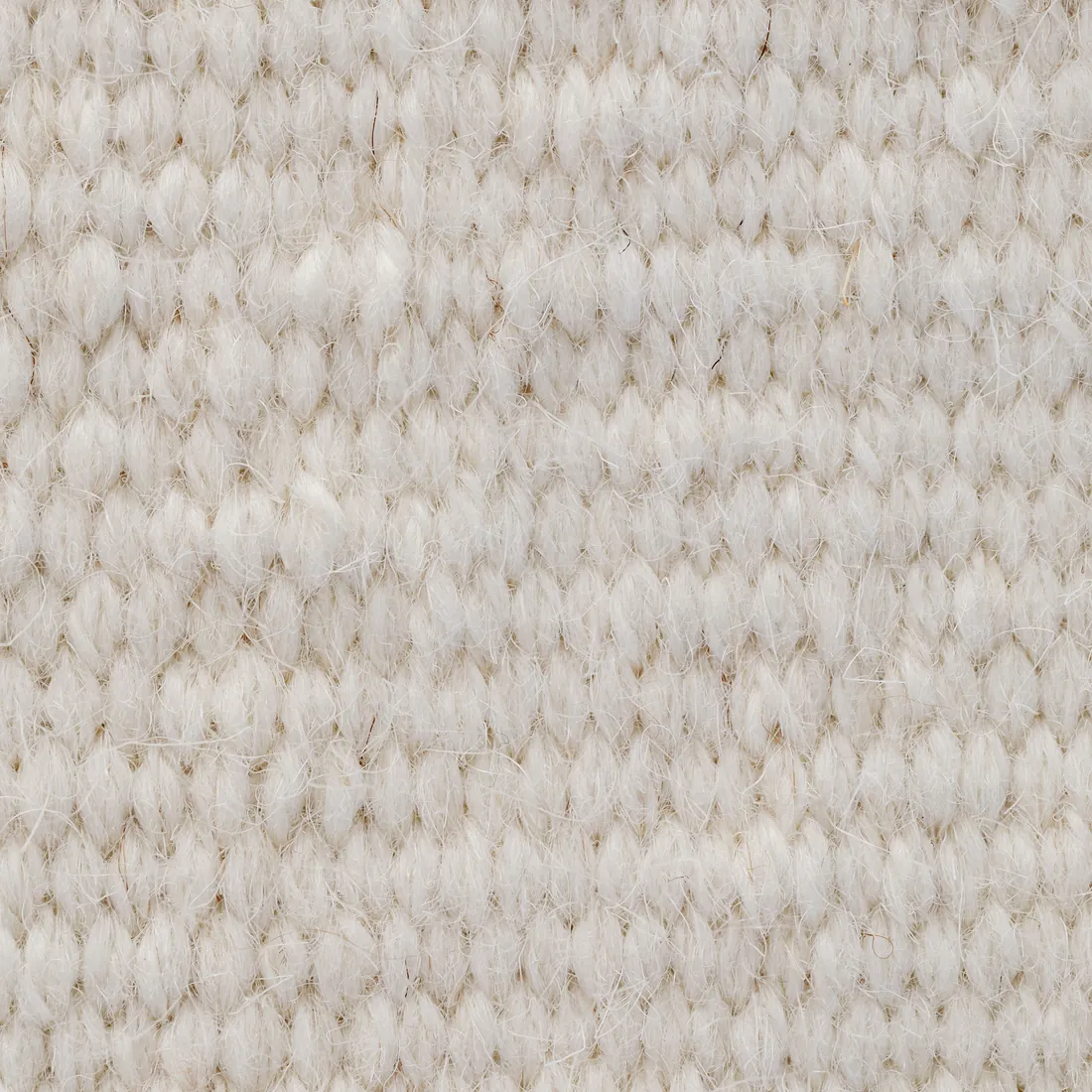 Close study of undyed lambswool cloth in natural ecru